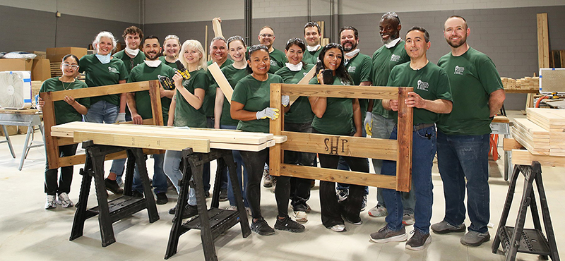 Bank employees volunteering at Sleep In Heavenly Peace
